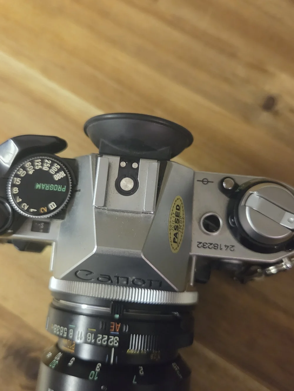 Canon Silver SLR Camera with Black Tamron 80-210mm Lens